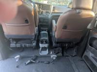 Behind Front Seats